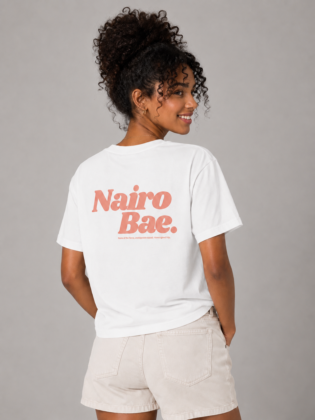 Nairobae White T-Shirt with Peach Ink