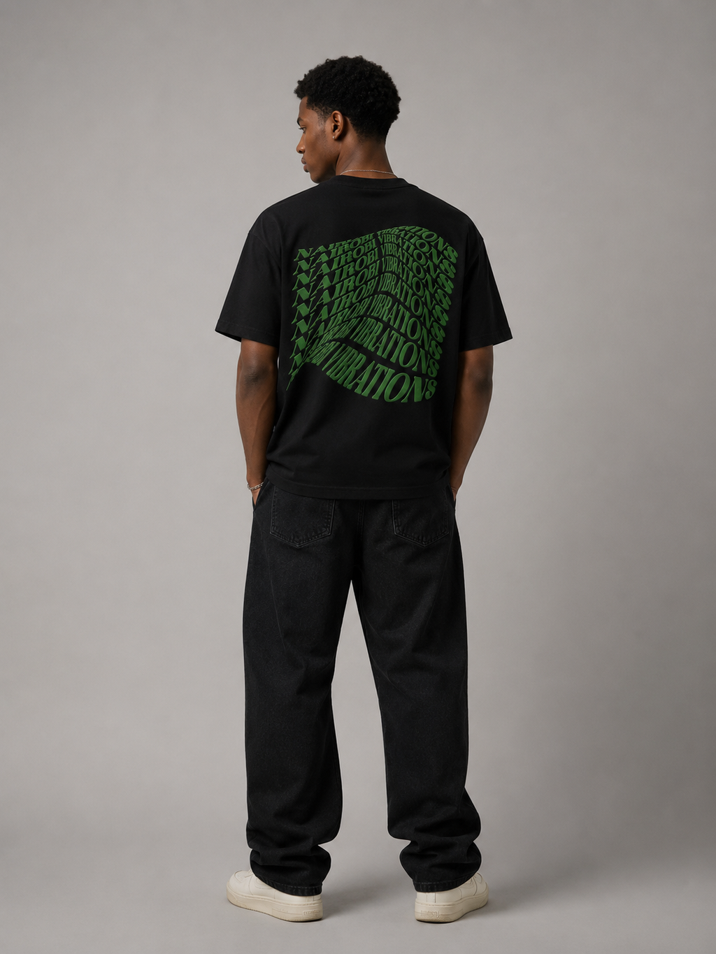 Nairobi Vibrations Black T-Shirt with Green Ink