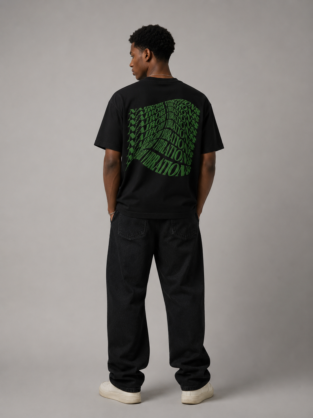 Nairobi Vibrations Black T-Shirt with Green Ink