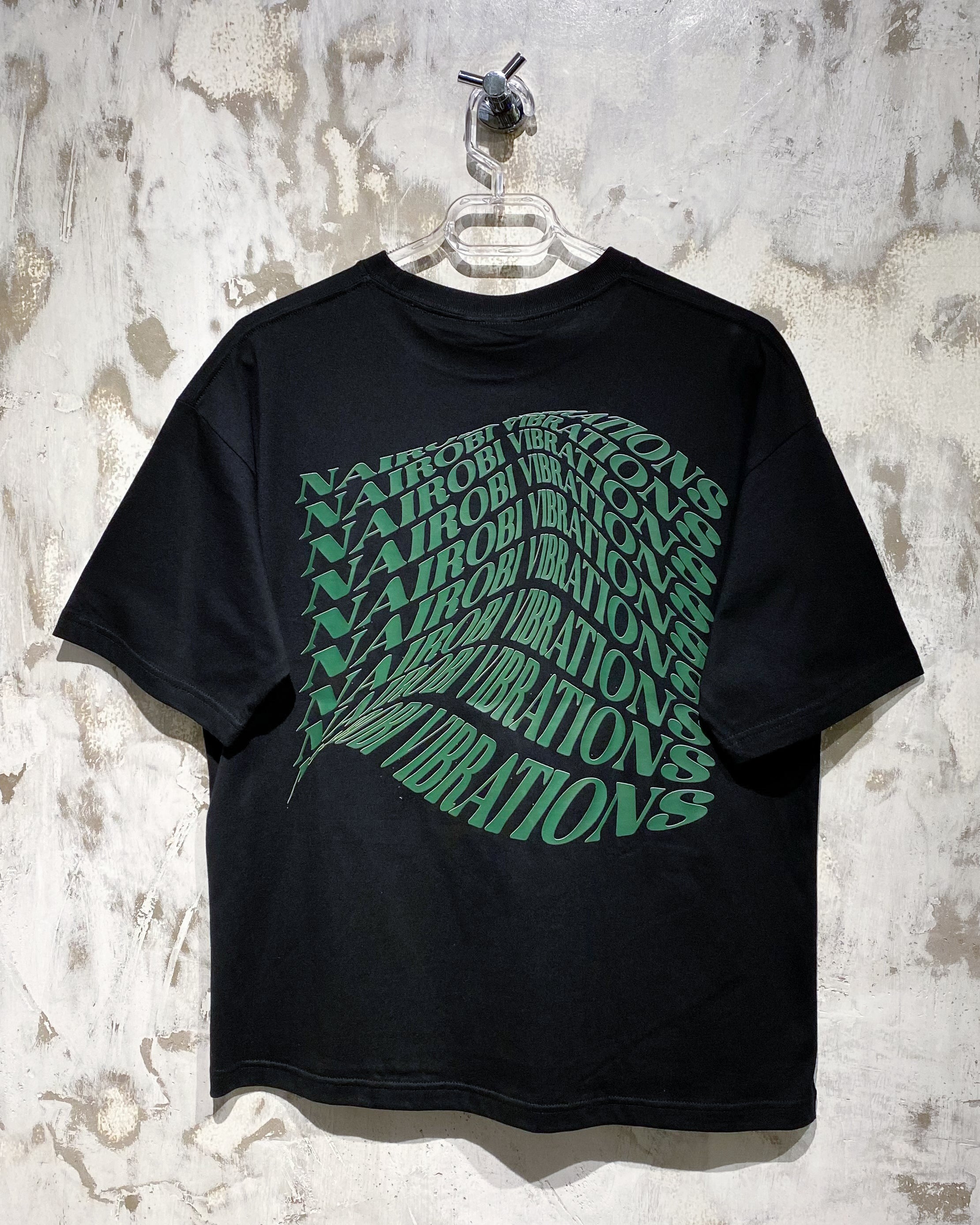 Nairobi Vibrations Black T-Shirt with Green Ink