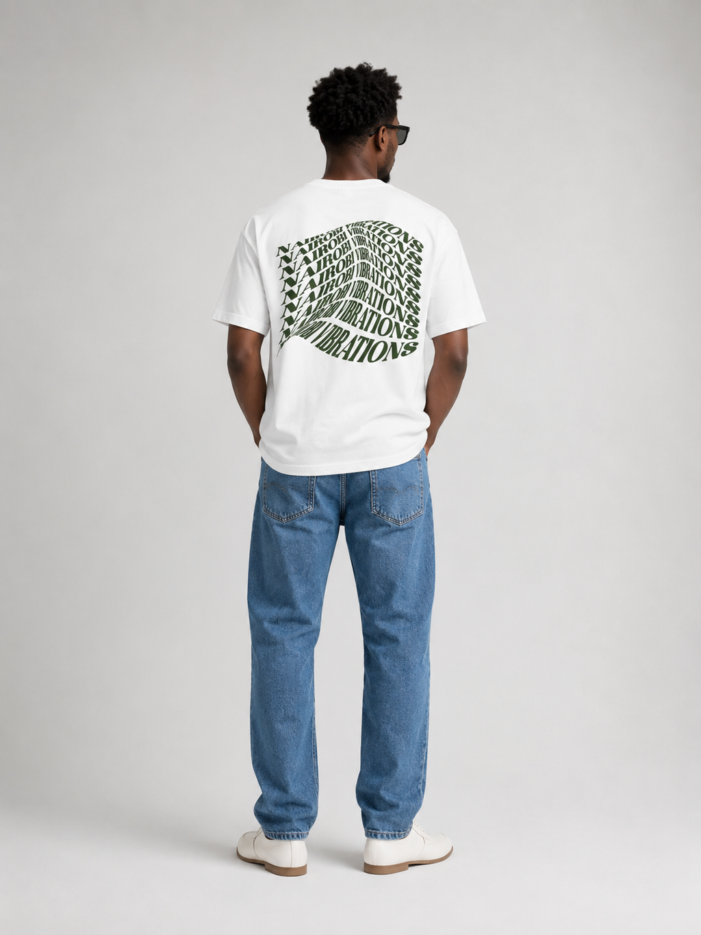 Nairobi Vibrations White T-Shirt With Green Ink