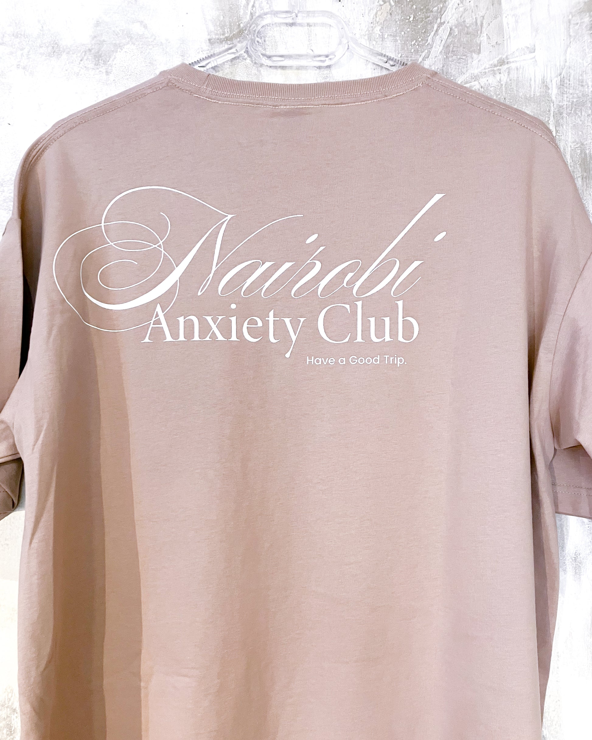 Nairobi Anxiety Club Smokey Pink T-shirt with White Ink