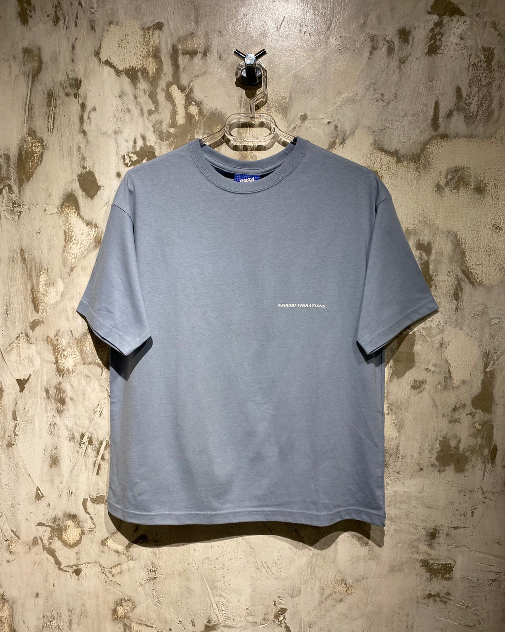 Nairobi Vibrations Blue T-Shirt with White Ink