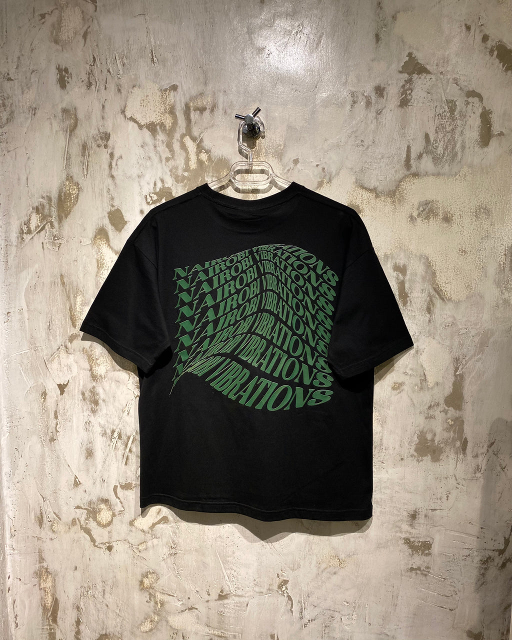 Nairobi Vibrations Black T-Shirt with Green Ink